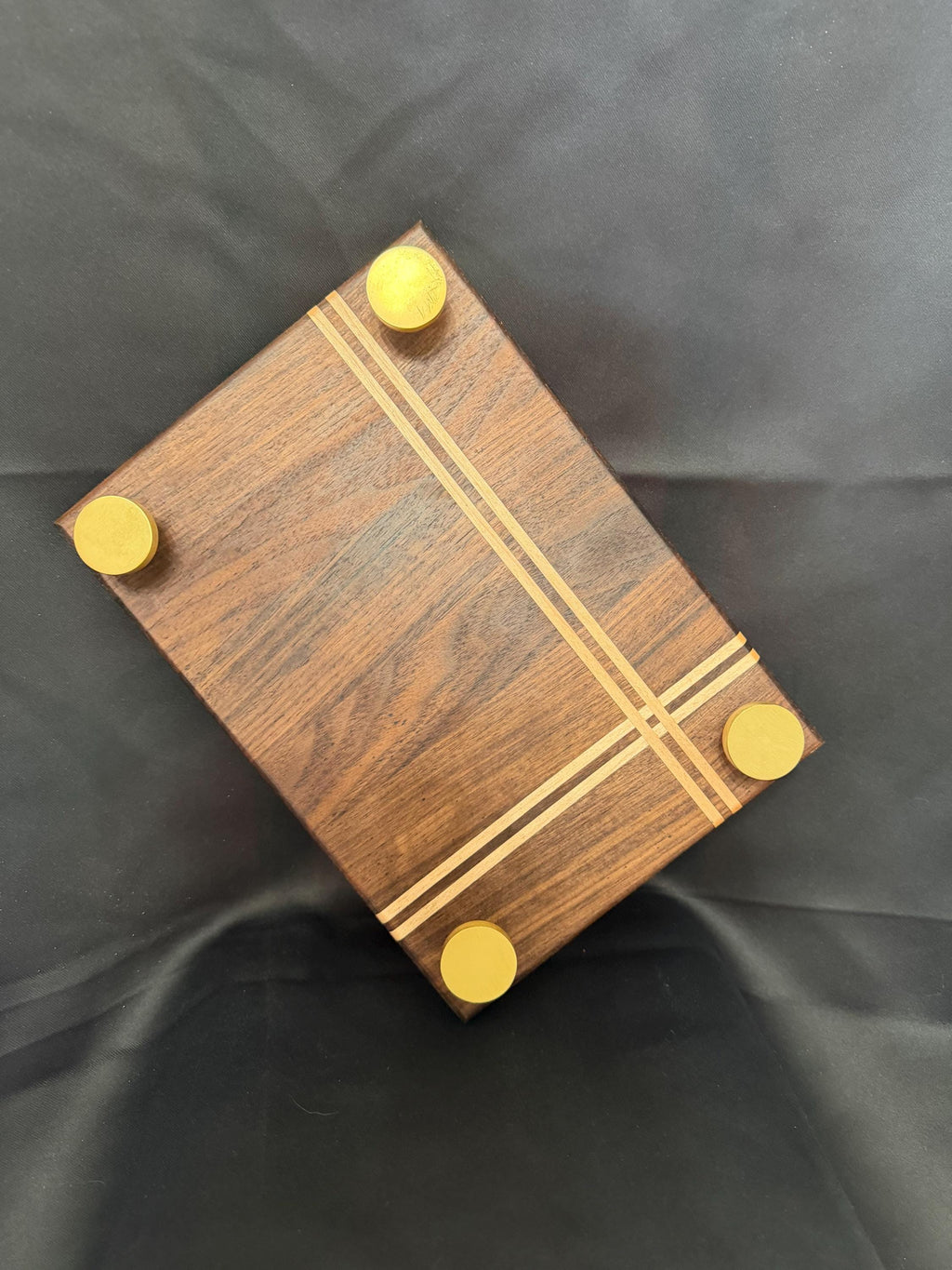 Handmade wooden centerpiece with maple detail.