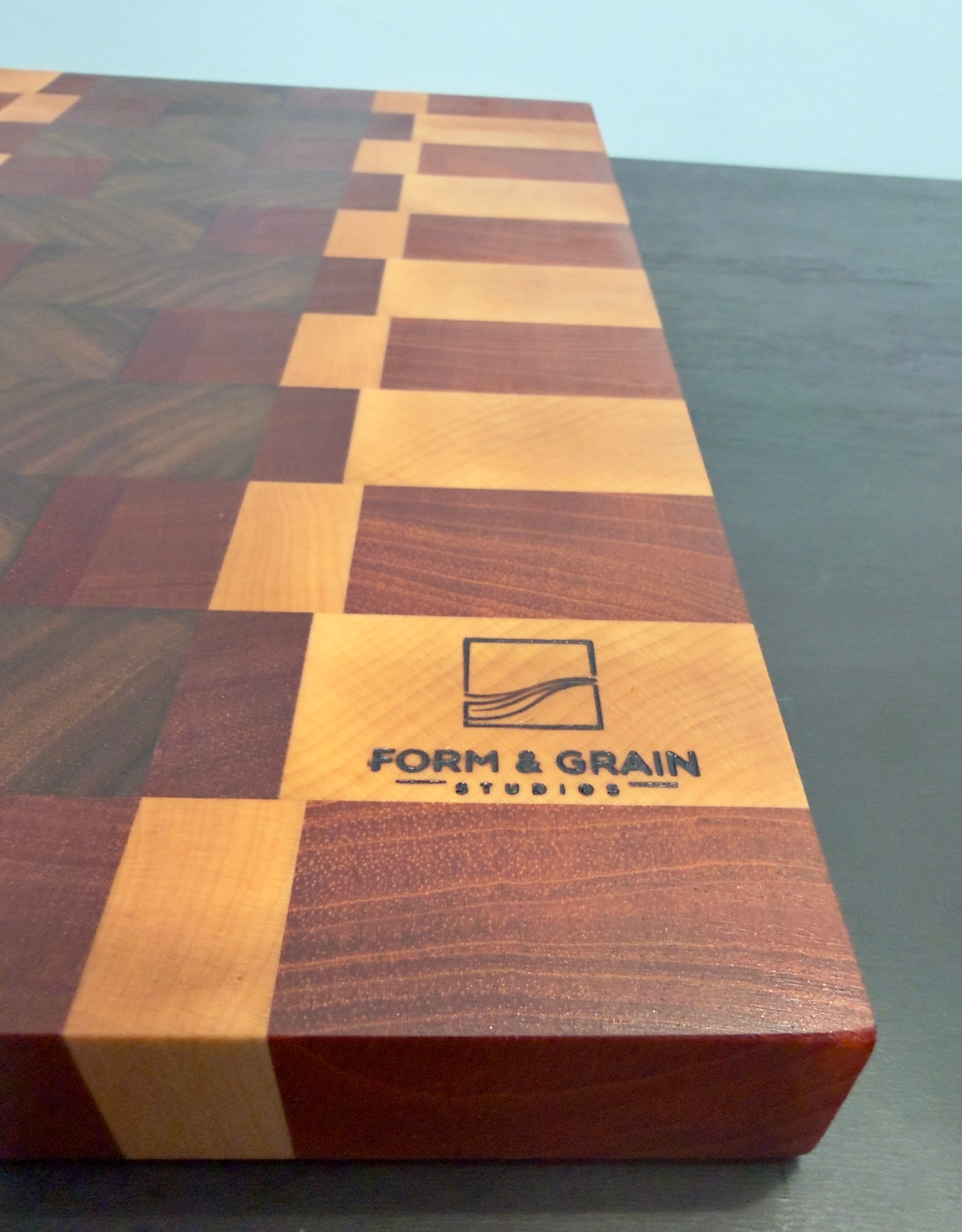 Cameroon Mahogany, Walnut, Maple and Padauk Cutting Board