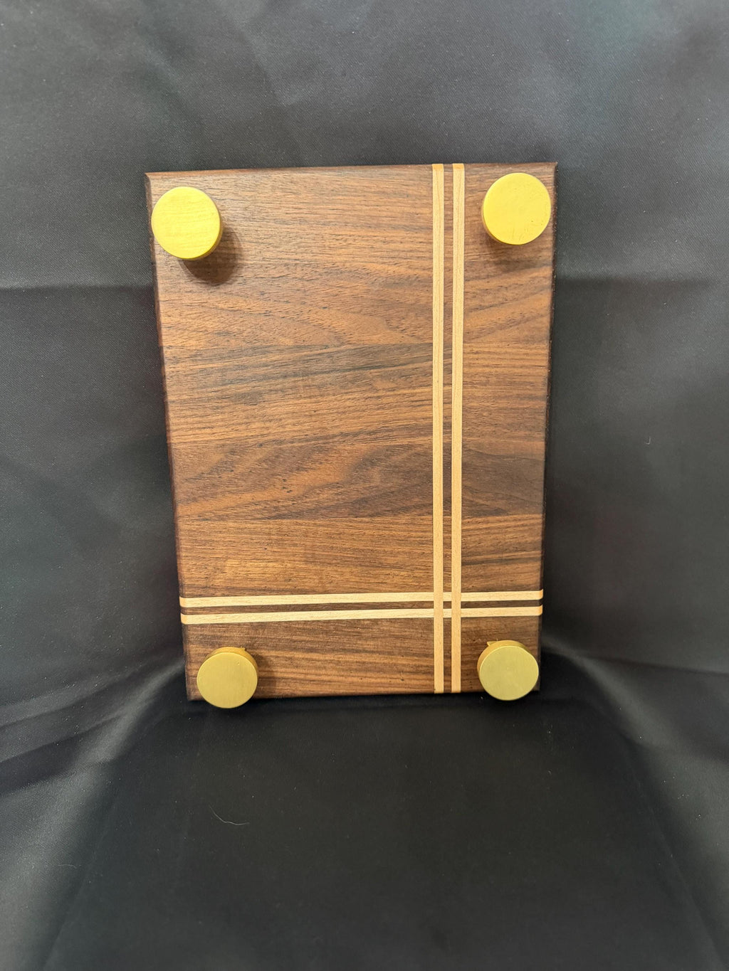 Handmade wooden centerpiece with maple detail.