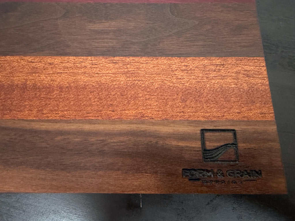 Walnut, Cherry, Maple, Purple Heart and Cameroon Mahogany Cutting board